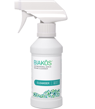 Bottle of BIAKŌS® Antimicrobial Skin & Wound Cleanser to Cleanse and Remove Microbes from the Wound Bed to Help Eliminate Planktonic, Immature and Mature Biofilms